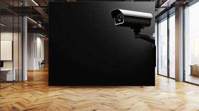 Security Camera Mounted on a Black Wall Wall mural