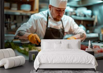 A chef is cutting a fish on a cutting board Wall mural