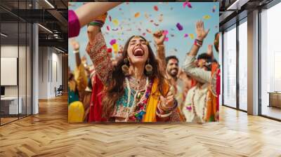 Group of people from diverse cultural backgrounds celebrating a festival together, wearing traditional attire. Wall mural