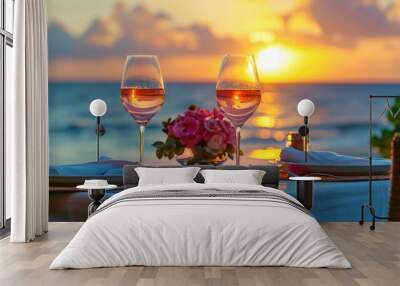 Summer love. Romantic sunset dinner on the beach. Table honeymoon set for two with luxurious food, glasses of rose wine drinks in a restaurant with sea view. Happy valentines day. Wall mural