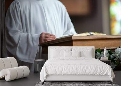 A  Clergyman's Hand Rests On A Bible On A Wooden Lectern Wall mural