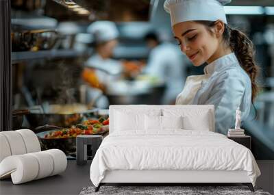 Female Chef Stirring Vegetables in a Pan in a Restaurant Kitchen Wall mural