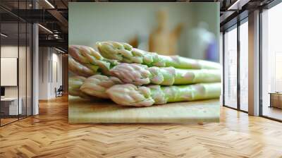 Fresh Green Asparagus Spears on a Wooden Cutting Board Wall mural