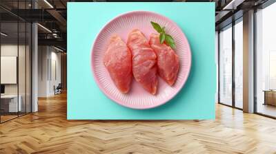 Raw Chicken Breast Fillet on Pink Plate with Basil Wall mural