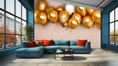 A selection of gold, white and glitter helium balloons with ribbons and streamers. New years eve party Wall mural