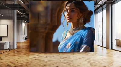 indian woman with a traditional blue dress, fictional person made with generative ai Wall mural