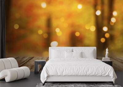 wooden table with blurred autumn forest background Wall mural