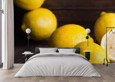 Group of fresh lemon on an old vintage wooden table Wall mural