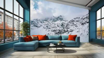 beautiful concentrated Rocky Mountains in a winter season with a huge carpet of snow in Tajikistan Wall mural