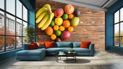 Heart-shaped still life of mixed tropical fruit Wall mural