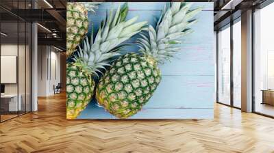 Three fresh green tropical pineapples Wall mural