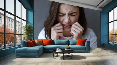 Young Woman Experiencing Anxiety and Stress Wall mural