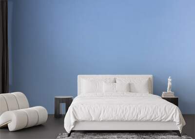 white fluffy clouds on the light blue sky background Wall mural