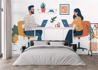 Two people sitting at a table with laptops, one of them is a woman Wall mural