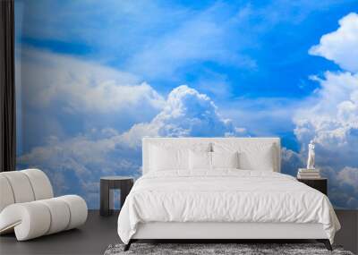 Cloudscape of summer blue sky background and white clouds in sunny day (with cloud space) Wall mural