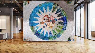 Season mosaic with white sun at sala Hipostila in Park Guell at Wall mural