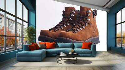 A pair of brown boots with a black sole Wall mural