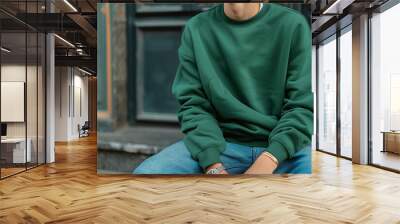 Mockup. Young men wearing blank white crewneck sweatshirt. Youngmen sitting on sofa in street ambient. Mock up template for sweatshirt design, print area for logo or design Wall mural