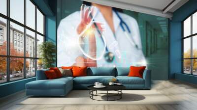 Cardiologist touching heart virtual reality for cardiology healthcare concept. Wall mural