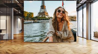 Girl smiling while visiting Paris on Seine River by Eiffel Tower Wall mural