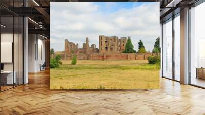 A panorama of the Kenilworth castle standing on a low hill, which was located in the heart of a 1,600 hectare park and is surrounded by a large artificial lake. Wall mural