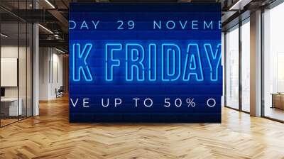 Advertisement of Black Friday Sale. Bright and enticing design with luminous neon letters on brick wall background. Ad offer discount on shopping day. Vector illustration. Wall mural