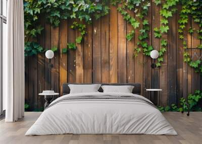 background of a wooden fence covered in ivy and climbing plants Wall mural