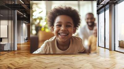 Family bonding at home, parents and children engaged in a playful activity, warm atmosphere, joyful expressions, soft background blur Wall mural