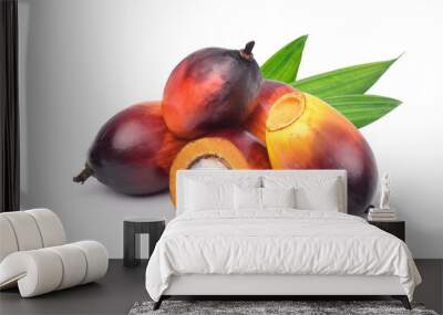 Group of  Oil Palm fruits and cut in half with green leaf isolated on white background. Wall mural