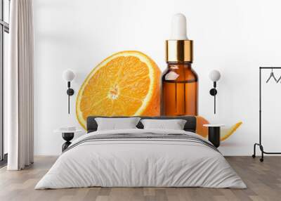 Orange essential oil in amber dropper bottle with orange fruit  and peel isolated on white background. Wall mural