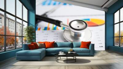 Stethoscope on graph, Finance, economy business data. Wall mural