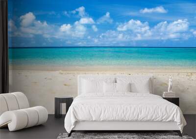 Beautiful beach with white sand. Tropical sea with cloudy blue sky . Amazing beach landscape Wall mural