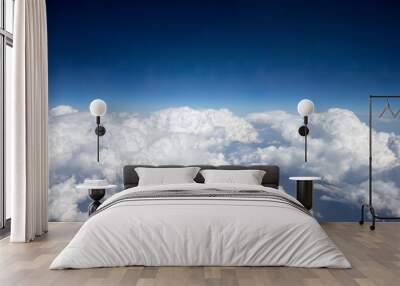 Blue Sky background with tiny Clouds. Summer blue sky. Sky clouds. Blue sky and white clouds background Wall mural