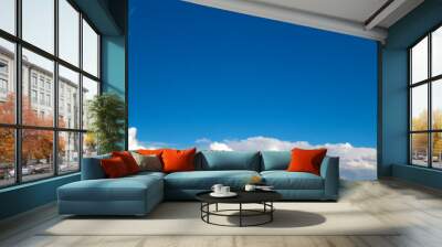 Panoramic fluffy cloud in the blue sky. Sky with cloud on a sunny day. Wall mural