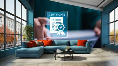 Business standard certificate concept. Businessman use laptop with virtual screen of Certified business documents. International standard certification of product. Wall mural