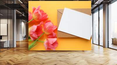 greeting card layout. bouquet of pink tulips on a yellow background and space for text Wall mural