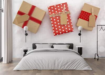 A Background of Elegantly Wrapped Gifts on a Bed of Snow Wall mural