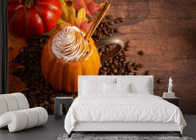 A Pumpkin Spice Latte on a Rustic Wooden Table Wall mural