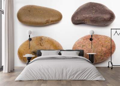 Collage of Four Smooth Stones on a White Background Wall mural