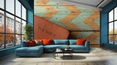 Holy Bible on a Rustic Wooden Table Wall mural