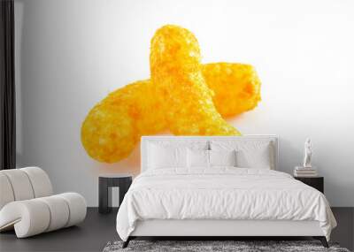 Orange Cheddar Cheese Puffs on a White Background Wall mural