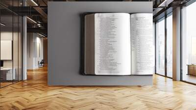 Single Bible Open on a Gray Background Wall mural