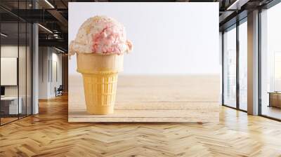 Strawberry Cheesecake Ice Cream in a Cone on a Picnic Table Wall mural