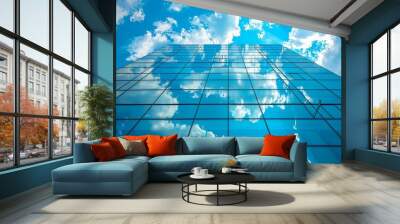 Modern Glass Building Reflecting Blue Sky and Clouds Wall mural