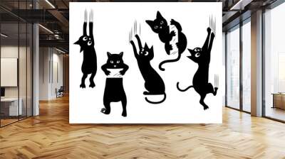 set of black cats scratching the wall. collection of silhouettes of funny kitten climbing the wall.  Wall mural