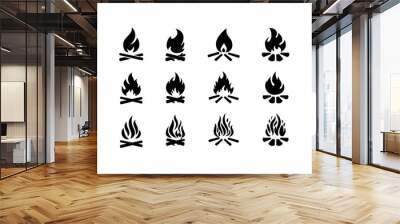 Campfire hand drawn vector illustration, retro style logo. Crossed logs and cartoon fire flame. Wall mural