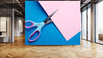 bright blue pink abstract blank paper background with scissors Wall mural