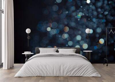 Abstract Blue bokeh of lights on black Wall mural