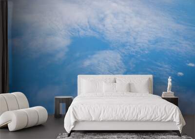 Capturing the fluffy white clouds and the blue sky Wall mural