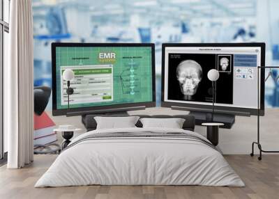 health information and patient x-ray show on two computer monitors on doctor desk. Wall mural